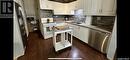 238 2Nd Avenue Nw, Swift Current, SK  - Indoor Photo Showing Kitchen With Double Sink 