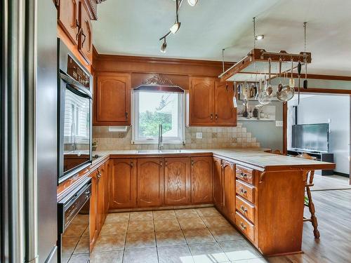 Cuisine - 18360 Rue Charles, Mirabel, QC - Indoor Photo Showing Kitchen With Double Sink