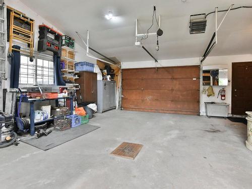 Garage - 18360 Rue Charles, Mirabel, QC - Indoor Photo Showing Garage