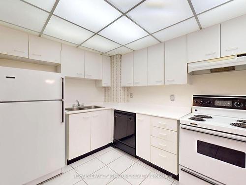 1401-155 Hillcrest Ave, Mississauga, ON - Indoor Photo Showing Kitchen With Double Sink