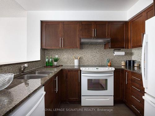 518-2261 Lakeshore Blvd, Toronto, ON - Indoor Photo Showing Kitchen With Double Sink