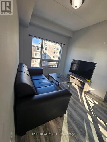 H505 - 275 Larch Street, Waterloo, ON - Indoor Photo Showing Living Room With Fireplace