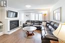 26 - 2300 Brays Lane, Oakville, ON  - Indoor Photo Showing Living Room With Fireplace 