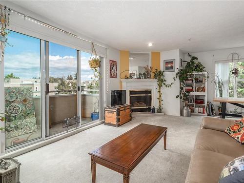 404-1361 Hillside Ave, Victoria, BC - Indoor Photo Showing Living Room With Fireplace