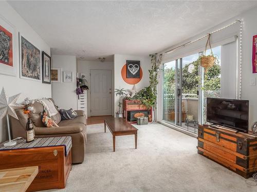 404-1361 Hillside Ave, Victoria, BC - Indoor Photo Showing Living Room With Fireplace