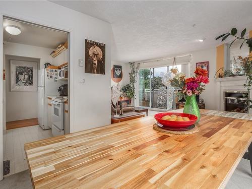 404-1361 Hillside Ave, Victoria, BC - Indoor Photo Showing Living Room With Fireplace