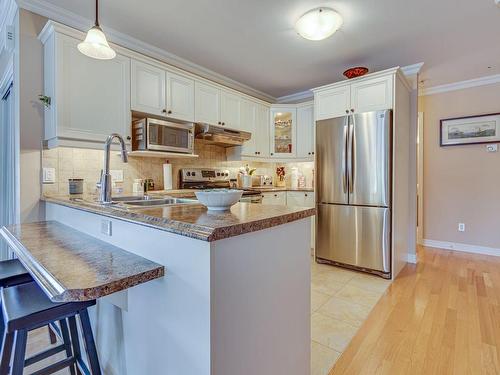 Kitchen - 295 Rue De Barcelone, Dollard-Des-Ormeaux, QC - Indoor Photo Showing Kitchen With Double Sink