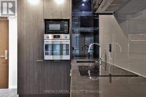 710 - 70 Temperance Street, Toronto (Bay Street Corridor), ON - Indoor Photo Showing Kitchen With Double Sink