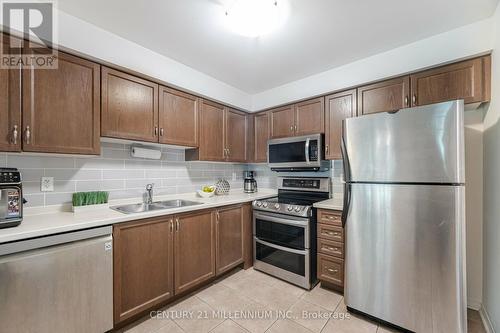 241 - 7360 Zinnia Place, Mississauga (Meadowvale Village), ON - Indoor Photo Showing Kitchen With Double Sink