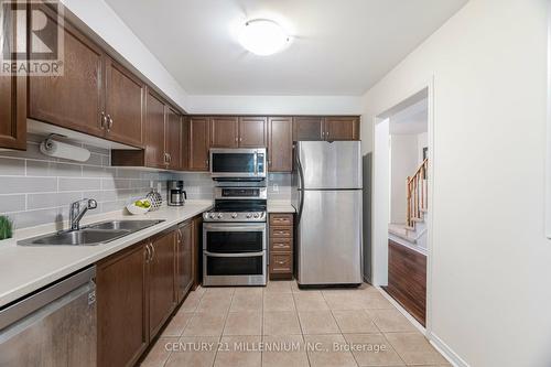 241 - 7360 Zinnia Place, Mississauga (Meadowvale Village), ON - Indoor Photo Showing Kitchen With Double Sink