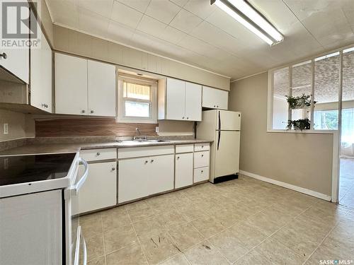 1957 Quebec Street, Regina, SK - Indoor Photo Showing Kitchen With Double Sink