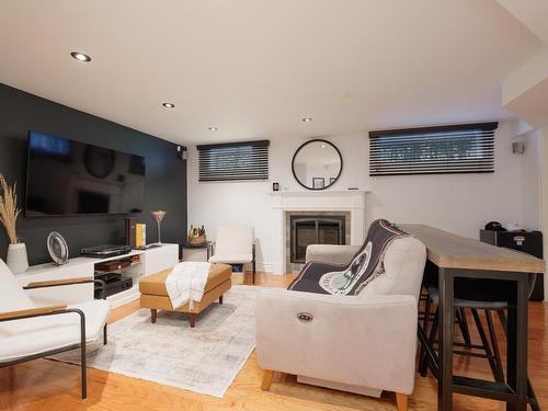 Salle familiale - 71 Boul. De Fontainebleau, Blainville, QC - Indoor Photo Showing Living Room With Fireplace