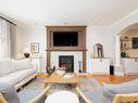 Salon - 71 Boul. De Fontainebleau, Blainville, QC  - Indoor Photo Showing Living Room With Fireplace 