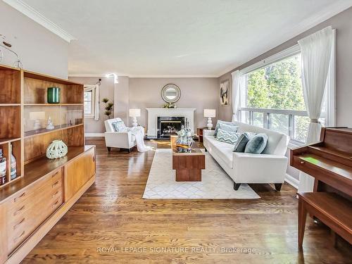 46 Mcdairmid Rd, Toronto, ON - Indoor Photo Showing Living Room With Fireplace