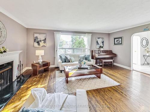 46 Mcdairmid Rd, Toronto, ON - Indoor Photo Showing Living Room With Fireplace