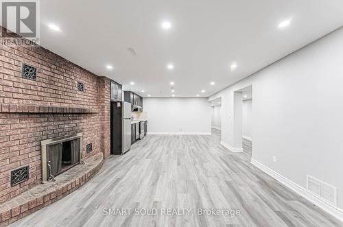 8412 Islington Avenue, Vaughan (Islington Woods), ON - Indoor Photo Showing Other Room With Fireplace