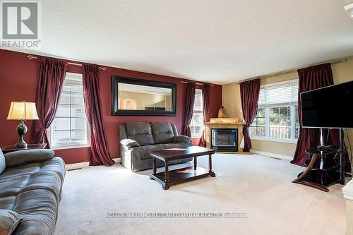 30 Illinois Crescent, Wasaga Beach, ON - Indoor Photo Showing Living Room With Fireplace