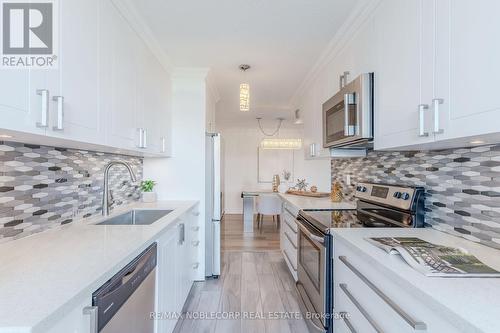 408 - 21 Knightsbridge Road, Brampton (Queen Street Corridor), ON - Indoor Photo Showing Kitchen With Upgraded Kitchen