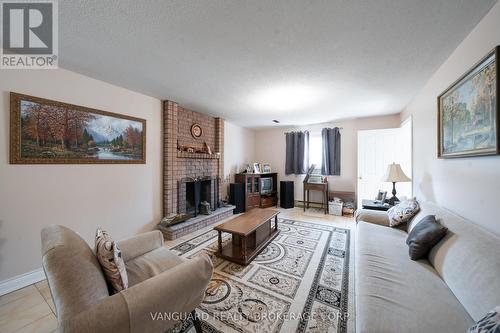 5 Norris Place, Toronto (Humberlea-Pelmo Park), ON - Indoor Photo Showing Living Room With Fireplace