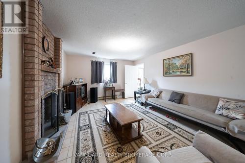 5 Norris Place, Toronto (Humberlea-Pelmo Park), ON - Indoor Photo Showing Living Room With Fireplace