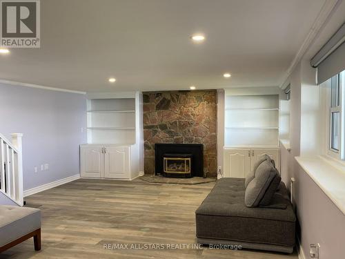 832 Cedar Glen Road, Kawartha Lakes, ON - Indoor Photo Showing Living Room With Fireplace