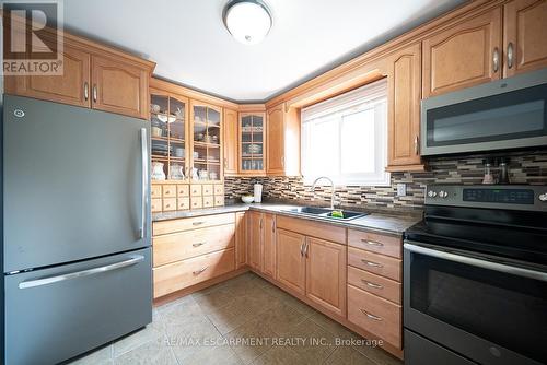 27 Mulholland Drive, Brant, ON - Indoor Photo Showing Kitchen With Double Sink