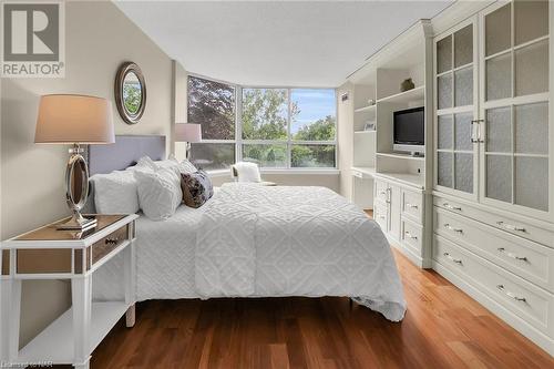 Primary bedroom w/blt-ins. - 3 Towering Heights Boulevard Unit# 303, St. Catharines, ON - Indoor Photo Showing Bedroom