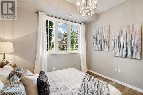 103 - 84 Aspen Springs Drive, Clarington (Bowmanville), ON - Indoor Photo Showing Bedroom