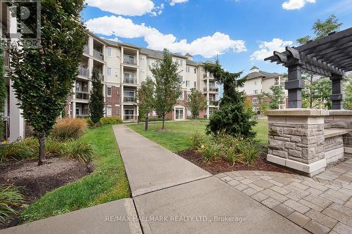 103 - 84 Aspen Springs Drive, Clarington (Bowmanville), ON - Outdoor With Facade