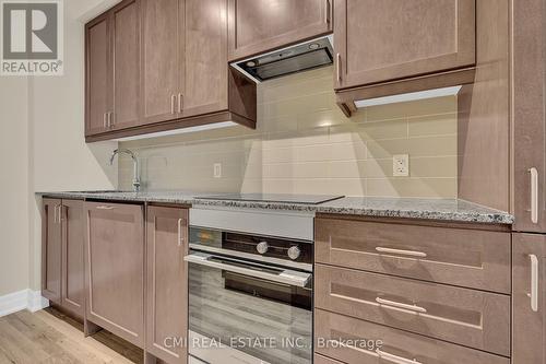 407 - 9075 Jane Street, Vaughan, ON - Indoor Photo Showing Kitchen