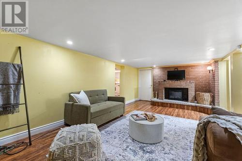 1064 Laporte, Windsor, ON - Indoor Photo Showing Living Room With Fireplace