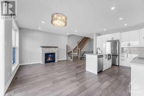 875 Contour Street Unit#B, Ottawa, ON - Indoor Photo Showing Kitchen With Fireplace With Upgraded Kitchen