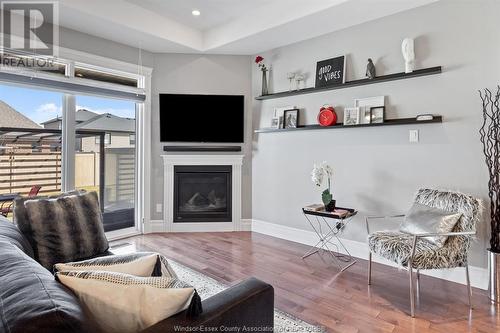 1622 Cypress, Windsor, ON - Indoor Photo Showing Living Room With Fireplace