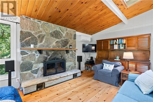 Cozy living room with cathedral ceilings - 7 Jay Street, Saugeen Shores, ON - Indoor Photo Showing Living Room With Fireplace