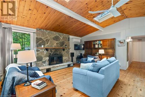 Wood burning fireplace - 7 Jay Street, Saugeen Shores, ON - Indoor Photo Showing Living Room With Fireplace