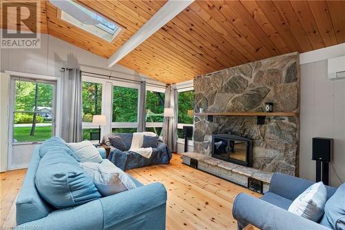 Newer skylight - 7 Jay Street, Saugeen Shores, ON - Indoor Photo Showing Living Room With Fireplace