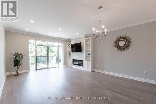 202 - 460 Callaway Road, London, ON - Indoor Photo Showing Living Room With Fireplace