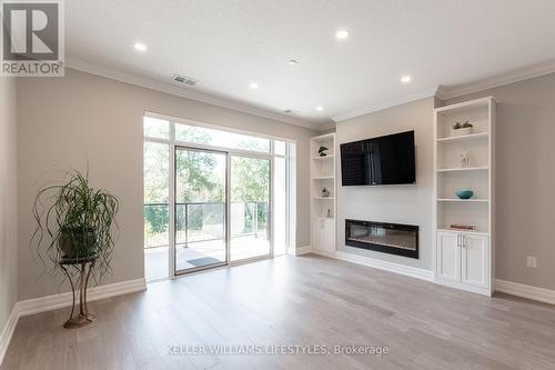 202 - 460 Callaway Road, London, ON - Indoor Photo Showing Living Room With Fireplace