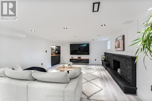 38 Neilson Drive, Toronto, ON - Indoor Photo Showing Living Room With Fireplace