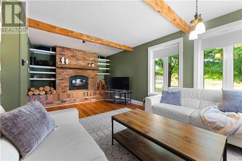 105 Halliday Creek Road, Burnstown, ON - Indoor Photo Showing Living Room With Fireplace