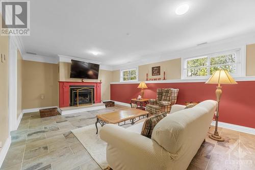 5668 Eloise Crescent, Ottawa, ON - Indoor Photo Showing Living Room With Fireplace