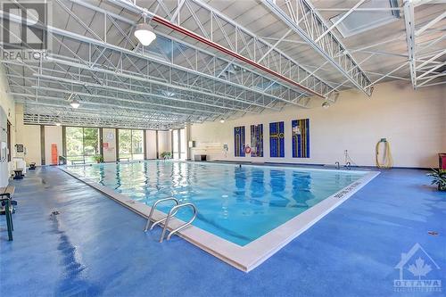 265 Poulin Avenue Unit#211, Ottawa, ON - Indoor Photo Showing Other Room With In Ground Pool