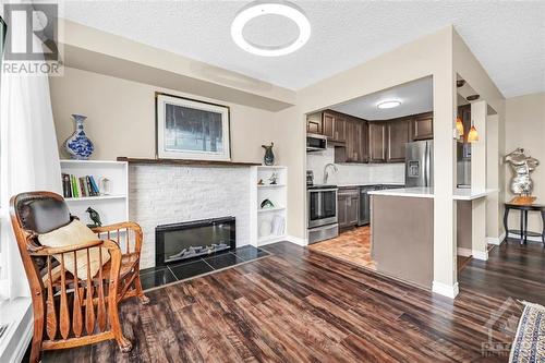 265 Poulin Avenue Unit#211, Ottawa, ON - Indoor With Fireplace