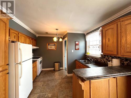 42 Confederation Street, Fortune, NL - Indoor Photo Showing Kitchen With Double Sink