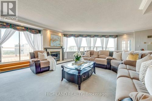 2313 - 168 Bonis Avenue, Toronto (Tam O'Shanter-Sullivan), ON - Indoor Photo Showing Living Room With Fireplace