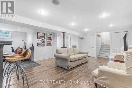 11 Richmond Street W, New Tecumseth, ON - Indoor Photo Showing Living Room With Fireplace