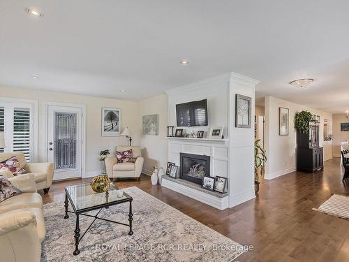 22 King St S, Innisfil, ON - Indoor Photo Showing Living Room With Fireplace