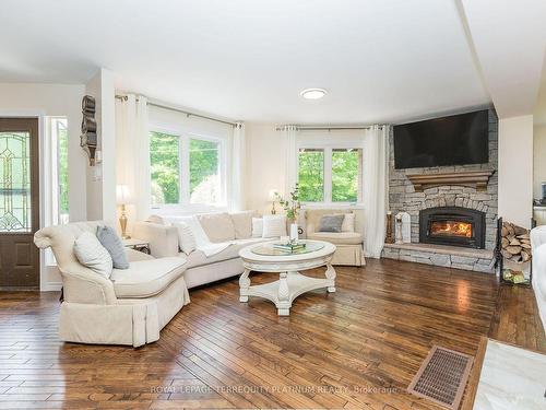 136 Wolfe Tr, Tiny, ON - Indoor Photo Showing Living Room With Fireplace