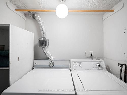 704-812 Burnhamthorpe Rd, Toronto, ON - Indoor Photo Showing Laundry Room