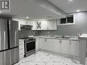 91 Earlsbridge Boulevard, Brampton, ON  - Indoor Photo Showing Kitchen With Stainless Steel Kitchen With Double Sink 